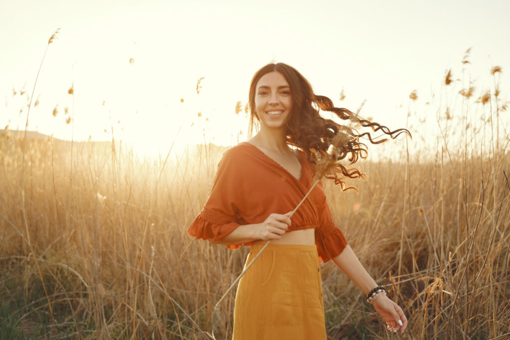 stylish woman spending time in a summer field 2026 03 16 02 10 53 utc