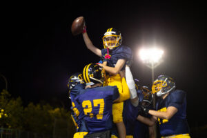 football team celebration at night under bright li 2026 03 25 22 56 18 utc