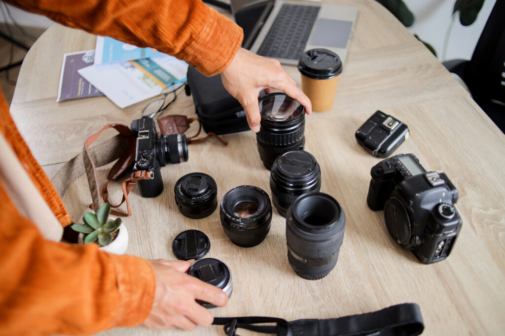 photographer organizing professional cameras and l 2026 06 25 00 53 27 utc